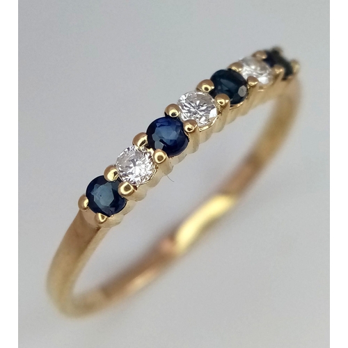 789 - 9K YELLOW GOLD DIAMOND & SAPPHIRE 7 STONE SET RING, WEIGHT 1.2G SIZE P