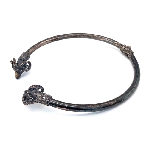 802 - A SOLID SILVER HINGED DOUBLE RAMS HEAD NECK PIECE PERFECT FOR SATANIC RITUALS .   58gms