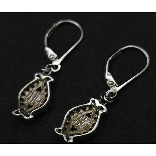 892 - Stunning Sterling Silver Evil Eye Design Stone Set Earrings. 

3cm Length, Secure Fit.