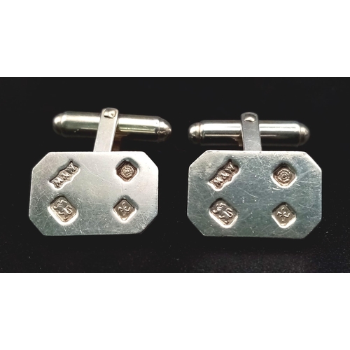 614 - A Pair of 1997 Hallmarked Mappin & Webb Silver Ingot Style Cufflinks.
Lever Action. 
Measure 1.6cm W... 