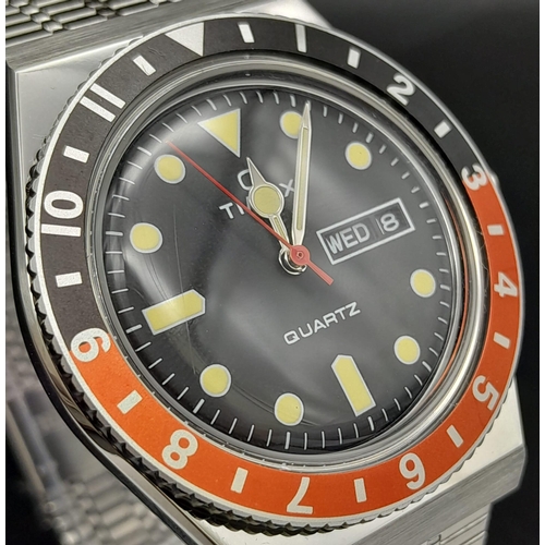 716 - An unworn Q Timex Reissue Watch.

38mm Stainless Steel Case. Black & Red Bezel Model.

Full Box & Ma... 