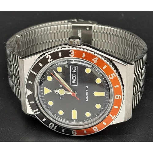 716 - An unworn Q Timex Reissue Watch.

38mm Stainless Steel Case. Black & Red Bezel Model.

Full Box & Ma... 