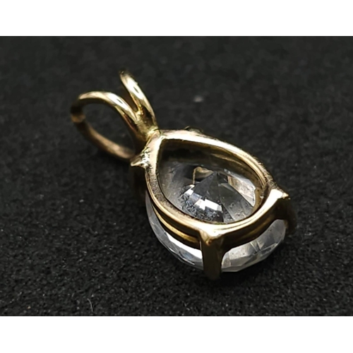 877 - 9K YELLOW GOLD PEAR SHAPE STONE SET PENDANT 

WEIGHT: 0.8G