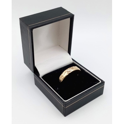 607 - A Completely Unique Vintage 14 Carat Yellow Gold and Diamond Set ‘Je T’Aime’ Detailed Love Ring.

Si... 