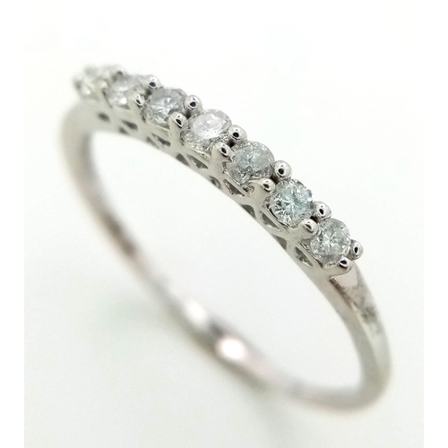 611 - 9K WHITE GOLD DIMAOND BAND RING 0.20CT 

WEIGHT: 1.2G 
SIZE K