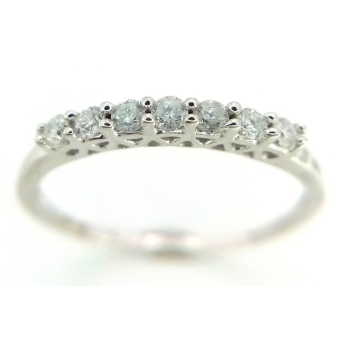 611 - 9K WHITE GOLD DIMAOND BAND RING 0.20CT 

WEIGHT: 1.2G 
SIZE K