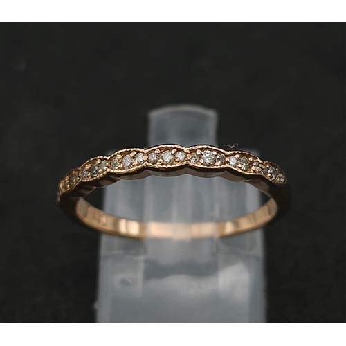 672 - 14K ROSE GOLD DIAMOND SET BAND RING, 2G SIZE N