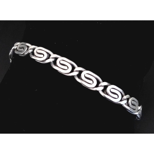 721 - STERLING SILVER FANCY LINK BRACELET 

WEIGHT: 21G