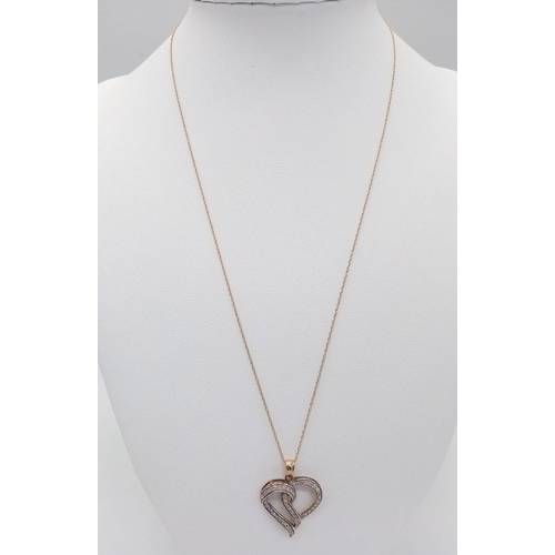 377 - 9K YELLOW GOLD DIAMOND SET OPEN HEART ON 9K YELLOW GOLD CHAIN

WEIGHT: 2.3G