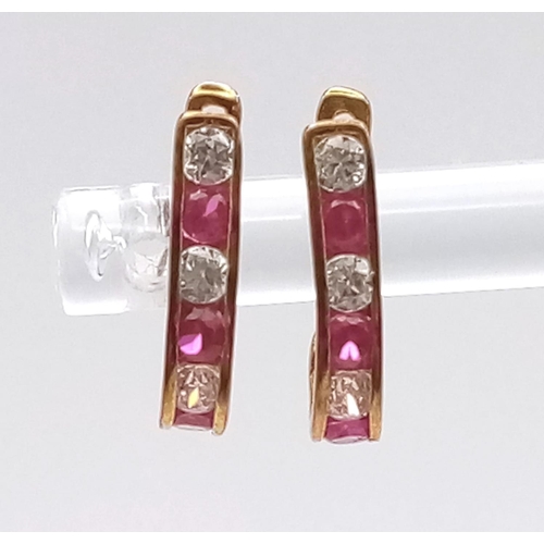 482 - 14K YELLOW GOLD RED AND WHITE STONE EARRINGS

WEIGHT: 1.1G