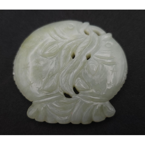 563 - A Vintage Jade Feng Shui Two Fish Amulet. 6cm x 5cm.