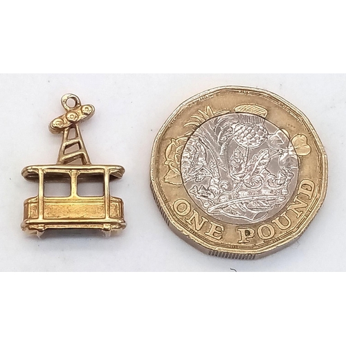 888 - 18K YELLOW GOLD CABLE CAR CHARM/PENDANT, WEIGHT 1.1G