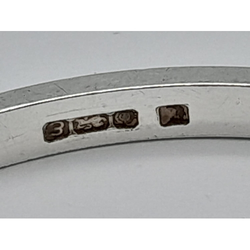 905 - A SOLID SILVER BANGLE . 23.4gms    6.5cmd DIAMETER