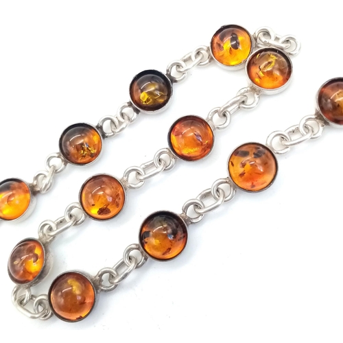 913 - A Vintage Sterling Silver Amber Cabochon Set Bracelet 18cm Length. 
Set with 7mm Round Cut Amber Cab... 