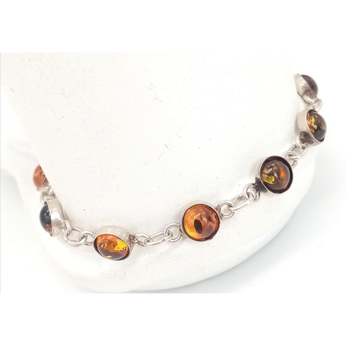 913 - A Vintage Sterling Silver Amber Cabochon Set Bracelet 18cm Length. 
Set with 7mm Round Cut Amber Cab... 