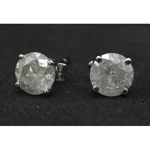 31 - BEAUTIFUL 18K WHITE GOLD DIAMOND SOLITAIRE STUD EARRINGS 

2CT APPROX TOTAL ( 1CT PER EAR ) 
WEIGHT:... 