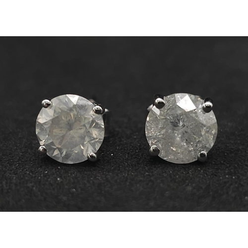 31 - BEAUTIFUL 18K WHITE GOLD DIAMOND SOLITAIRE STUD EARRINGS 

2CT APPROX TOTAL ( 1CT PER EAR ) 
WEIGHT:... 