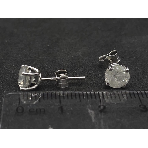 31 - BEAUTIFUL 18K WHITE GOLD DIAMOND SOLITAIRE STUD EARRINGS 

2CT APPROX TOTAL ( 1CT PER EAR ) 
WEIGHT:... 