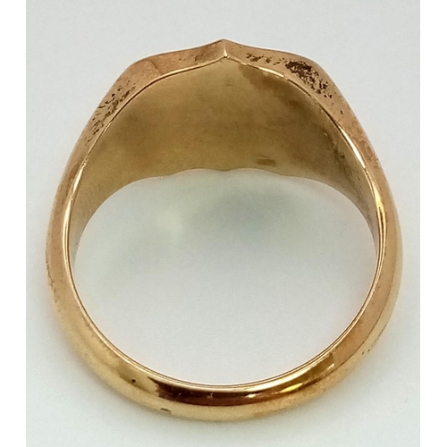 708 - A 9K Yellow Gold Shield Shape Signet Ring. Size R. 7.3g weight. Full UK hallmarks.