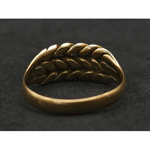 78 - An Antique 18K Yellow Gold Keeper Ring. Size N. 4.06g weight.