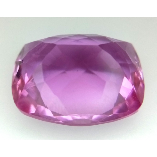 711 - A 27ct Lab Created Pink Rectangular Cut Topaz. Well faceted with no visible marks or inclusions. Tri... 