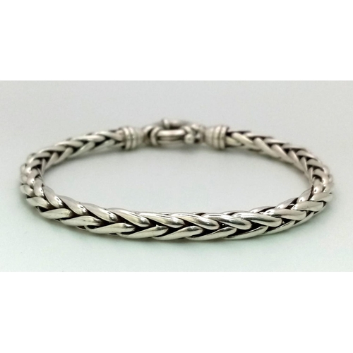 714 - STUNNING STERLING SILVER FANCY SNAKE LINK BRACELET 

WEIGHT: 23.5G