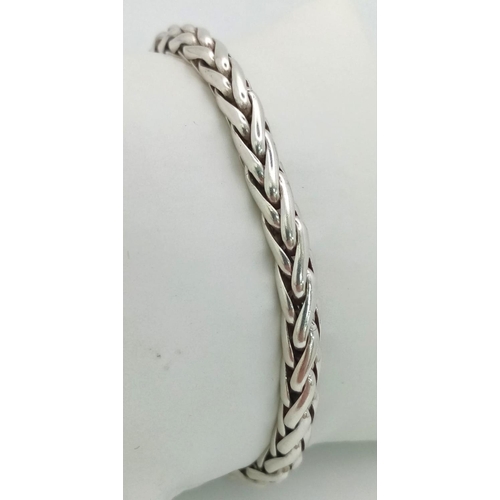 714 - STUNNING STERLING SILVER FANCY SNAKE LINK BRACELET 

WEIGHT: 23.5G