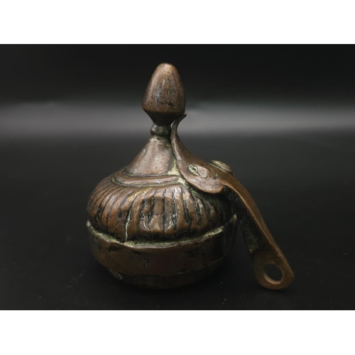 760 - An Ancient Chinese Metal Teapot. Hinge of lid is broken so a/f. 34cm tall.