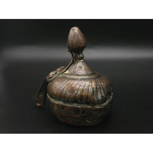 760 - An Ancient Chinese Metal Teapot. Hinge of lid is broken so a/f. 34cm tall.