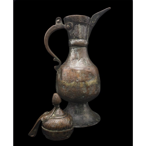 760 - An Ancient Chinese Metal Teapot. Hinge of lid is broken so a/f. 34cm tall.