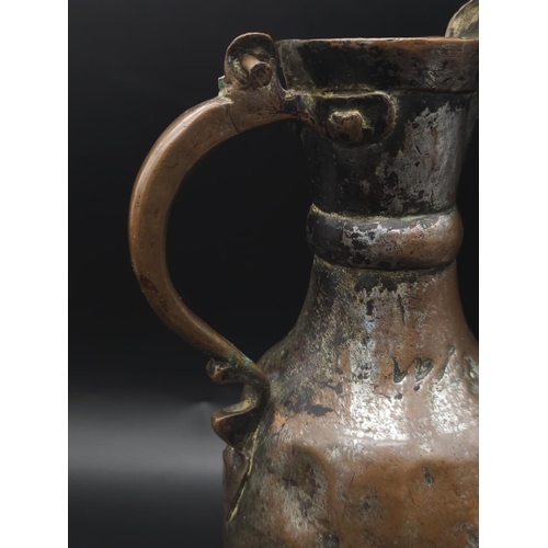 760 - An Ancient Chinese Metal Teapot. Hinge of lid is broken so a/f. 34cm tall.