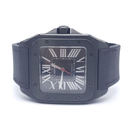 396 - A Stylish Cartier Santos 100 Automatic Gents Watch. Leather and textile strap. Black stainless steel... 