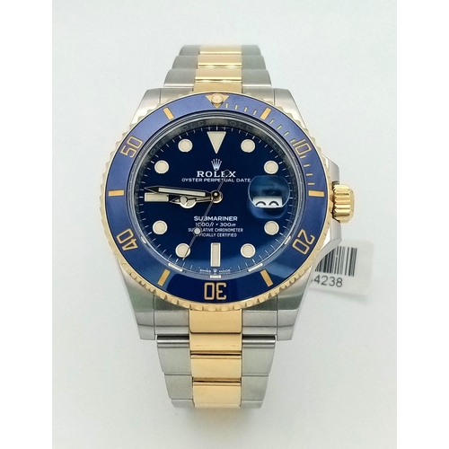 119 - A SUPERB UNWORN ROLEX SUBMARINER IN BI-METAL  WITH BOX AND PAPERS,  2020 MODEL.