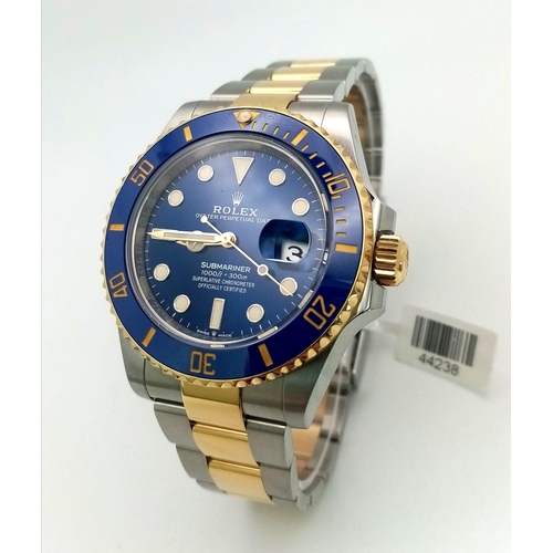 119 - A SUPERB UNWORN ROLEX SUBMARINER IN BI-METAL  WITH BOX AND PAPERS,  2020 MODEL.