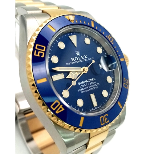 119 - A SUPERB UNWORN ROLEX SUBMARINER IN BI-METAL  WITH BOX AND PAPERS,  2020 MODEL.