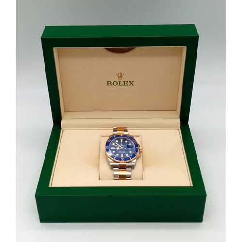 119 - A SUPERB UNWORN ROLEX SUBMARINER IN BI-METAL  WITH BOX AND PAPERS,  2020 MODEL.