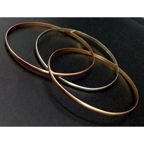 1126 - A 9K Tricolour Gold Interlocking Wedding Bangle. 12.73g weight.