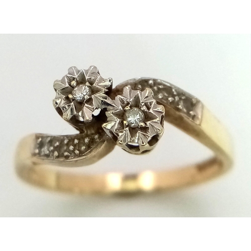 114 - A Vintage 9K Yellow Gold Diamond Crossover Ring. Size M. 2.22g total weight.