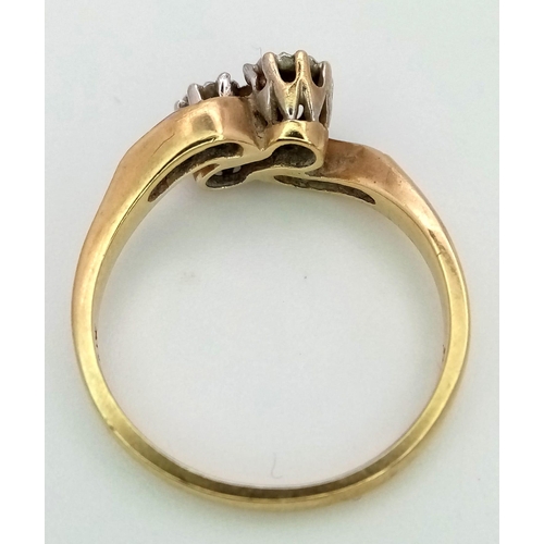 114 - A Vintage 9K Yellow Gold Diamond Crossover Ring. Size M. 2.22g total weight.