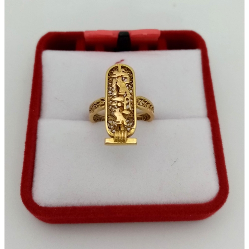 134 - An 18 K yellow gold filigree ring with a three dimensional cartouche of Cleopatra, the most beautifu... 