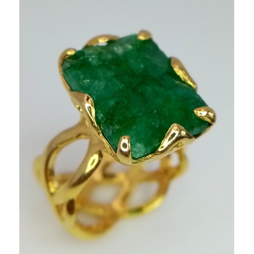 239 - A ring with the WOW factor, a silver and gold filled ring with a fabulous emerald cut emerald (16 x ... 