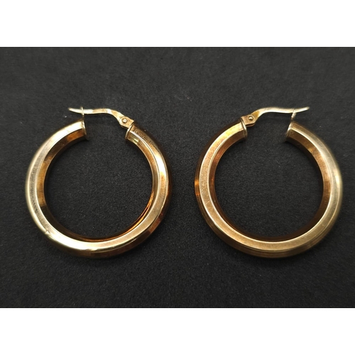 539 - A Pair of 9K Yellow Gold Hoop Earrings. 2.75g total weight.