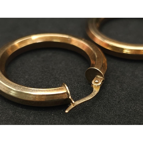 539 - A Pair of 9K Yellow Gold Hoop Earrings. 2.75g total weight.