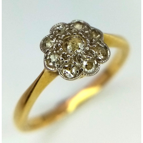 634 - An 18K Yellow Gold Diamond Floral Ring. Size K. 2.22g total weight.