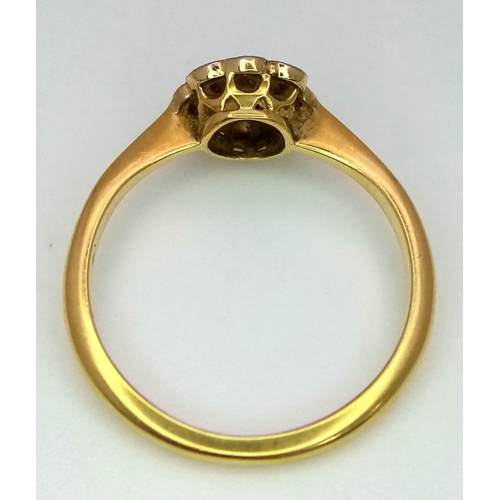 634 - An 18K Yellow Gold Diamond Floral Ring. Size K. 2.22g total weight.