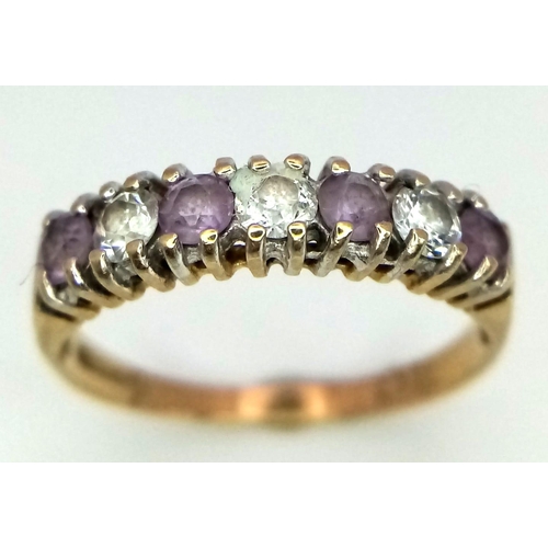 994 - A Vintage 9K Yellow Gold Amethyst and White Stone Ring. Size L. 1.42g total weight.