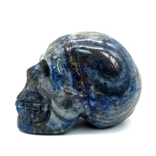 1019 - A Hand-Carved Lapis Lazuli Skull Figure. 5cm x 4cm