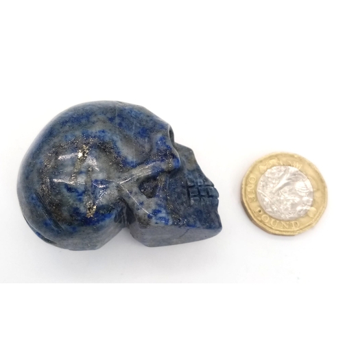 1019 - A Hand-Carved Lapis Lazuli Skull Figure. 5cm x 4cm