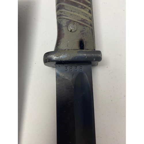 143 - A German WW2 K98 Camo Bayonet with Scabbard. It has markings of 3838f and the code S238G. The scabba... 