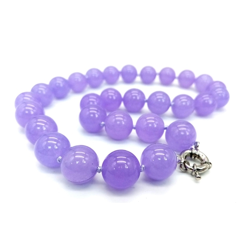 435 - A Large Lavender Jade Beaded Necklace. 42cm necklace length. Beads 14mm.